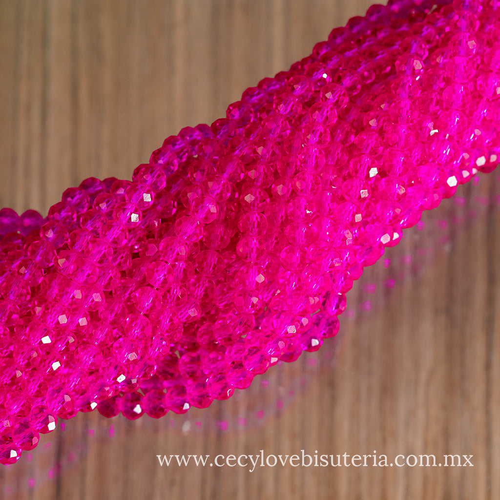 Cristal Rondel Fucsia Transparente 6 mm