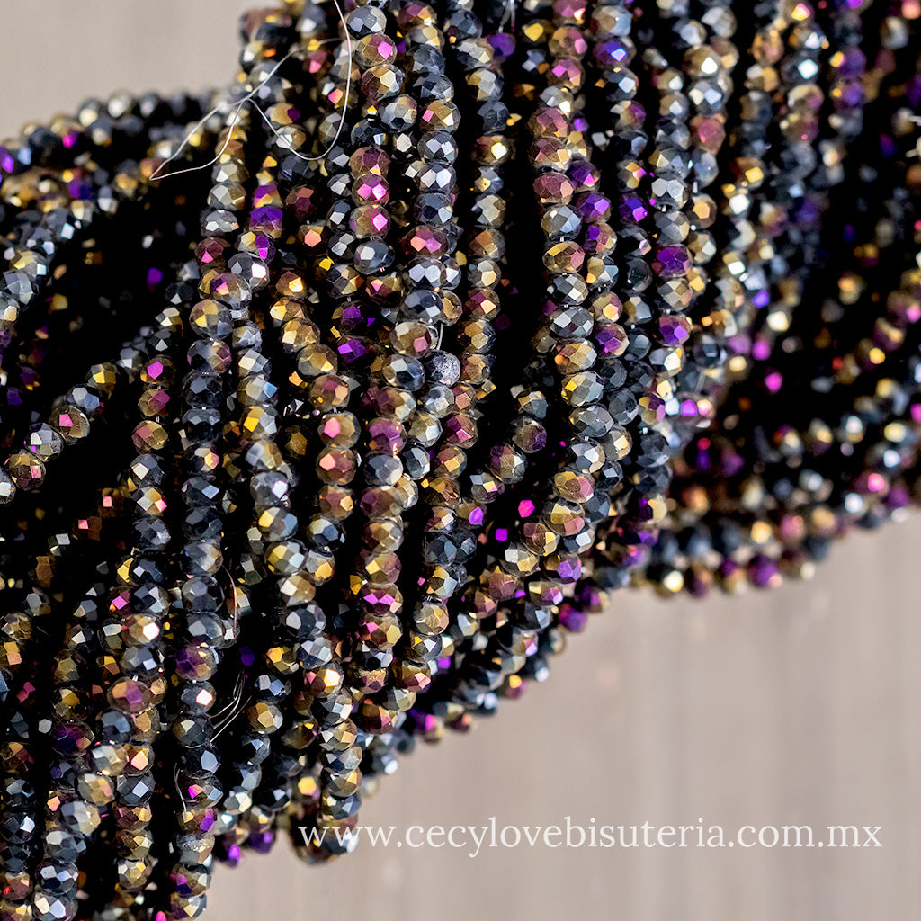 Cristal Rondel Morado / Dorado Metálico 2 mm